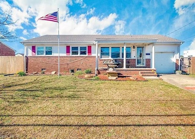 ranch-style house with a porch, a front yard, and a garage