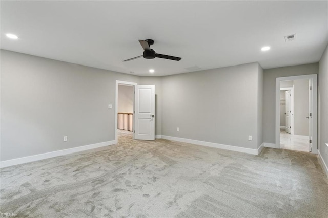 carpeted empty room with ceiling fan