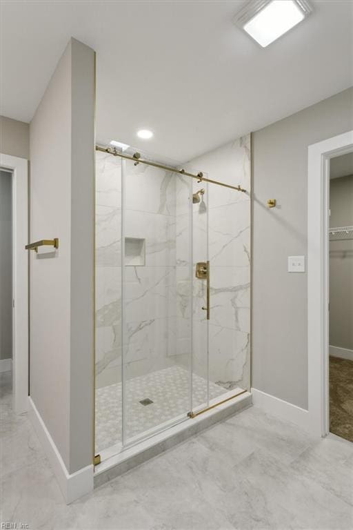 bathroom featuring an enclosed shower