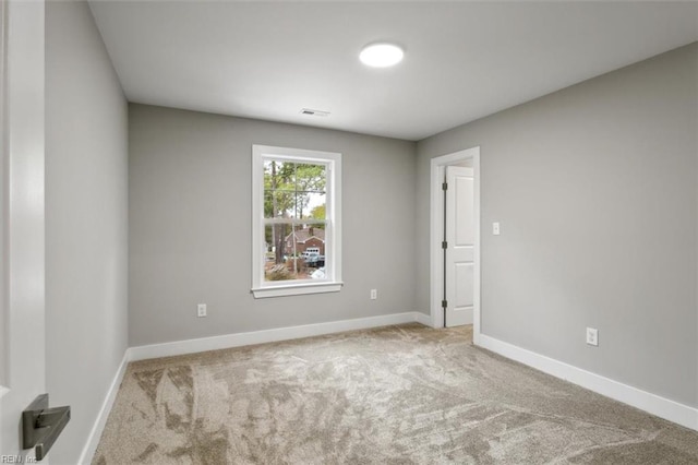 view of carpeted spare room