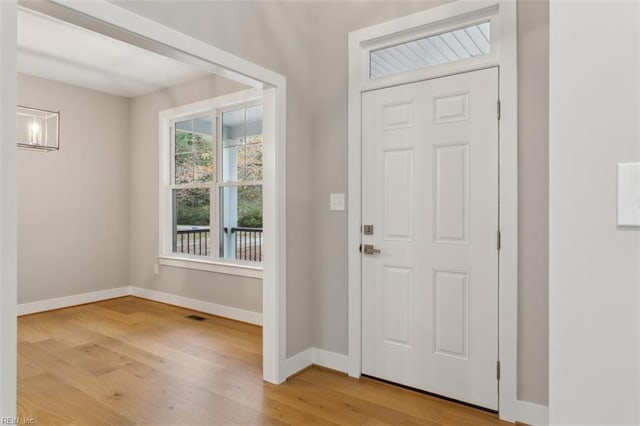 foyer entrance featuring light wood-type flooring