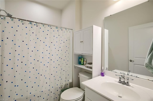 full bathroom featuring vanity, shower / bath combination with curtain, and toilet