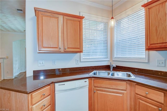 kitchen with dishwasher, pendant lighting, crown molding, and sink