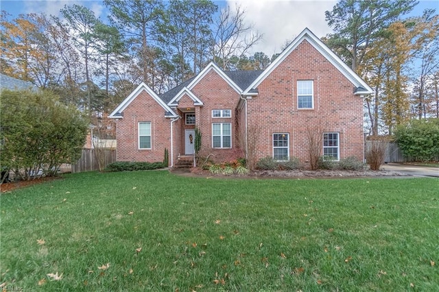 view of property featuring a front yard