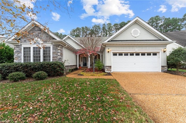 4756 Winterberry Ct, Williamsburg, VA 23188 - view of front facade featuring stone siding, an attached garage, concrete driveway, stucco siding, and a front lawn