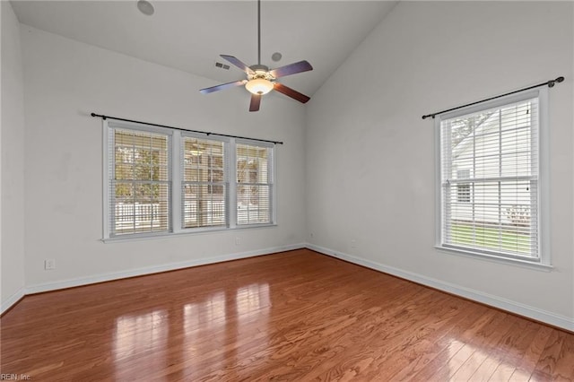 4756 Winterberry Ct, Williamsburg, VA 23188 - empty room with wood finished floors, lofted ceiling, ceiling fan, and plenty of natural light