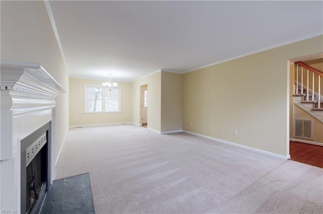 unfurnished living room featuring carpet floors, crown molding, and a notable chandelier