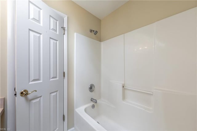 bathroom with shower / tub combination