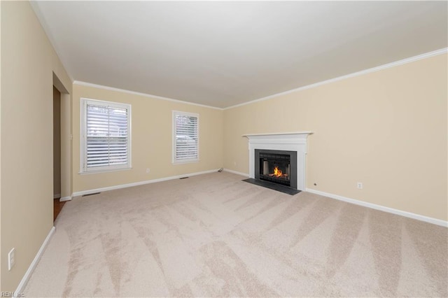 unfurnished living room featuring light colored carpet and crown molding