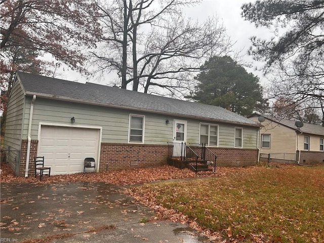 single story home with a garage