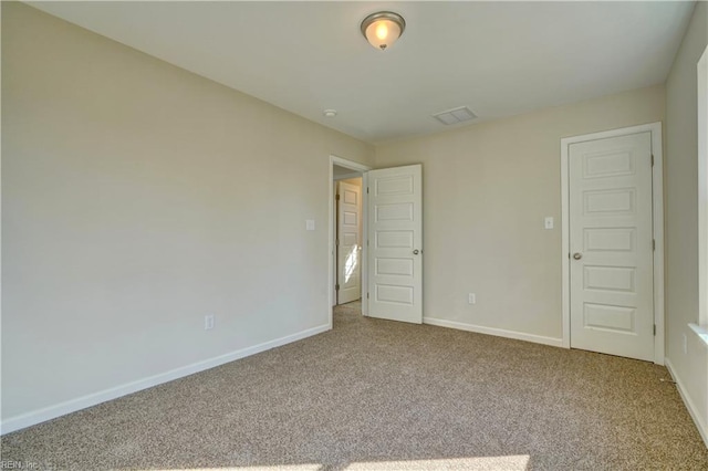 unfurnished bedroom with carpet and a closet