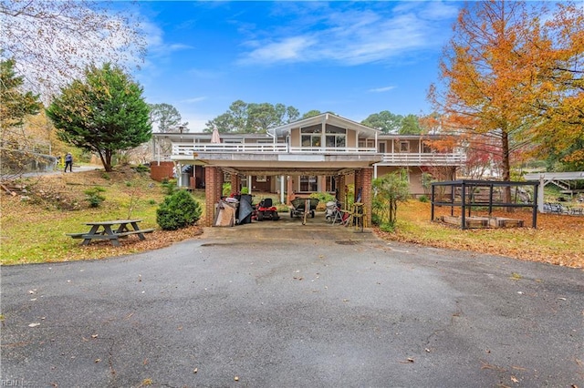 front facade featuring a carport