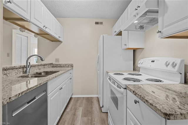 kitchen with sink, light hardwood / wood-style flooring, stainless steel dishwasher, electric stove, and white cabinets