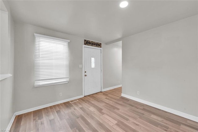 entrance foyer featuring light hardwood / wood-style floors