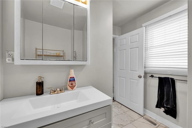 bathroom featuring vanity