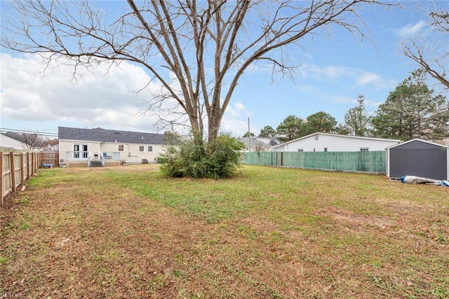 view of yard with a storage shed