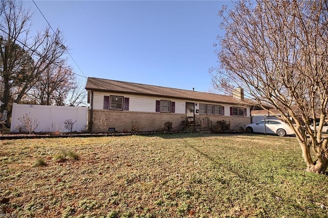 single story home with a front lawn