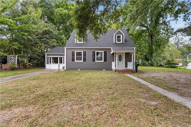 cape cod home with a front yard and a sunroom