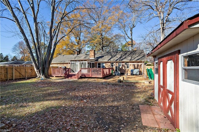 view of yard with a deck