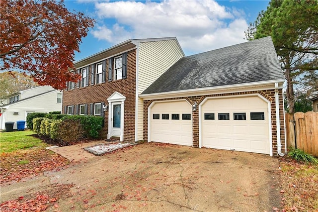 colonial inspired home with a garage