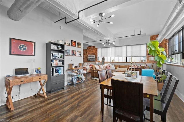 dining room with a chandelier, dark hardwood / wood-style floors, and a healthy amount of sunlight