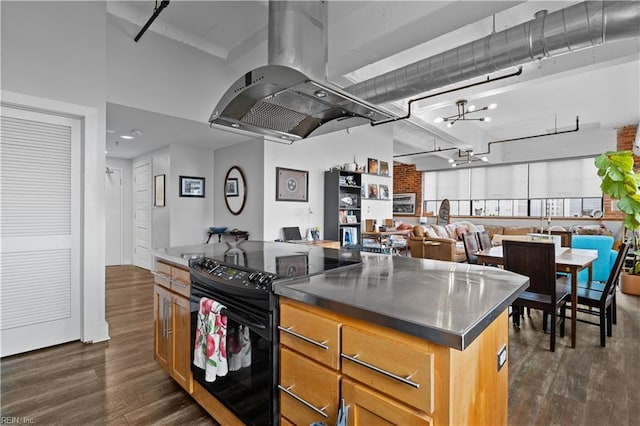 kitchen with a center island, dark wood-type flooring, island exhaust hood, and black electric range