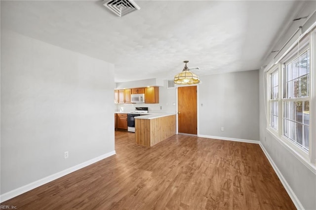 unfurnished living room featuring light hardwood / wood-style floors