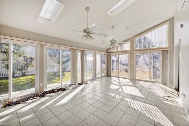 unfurnished sunroom with lofted ceiling with skylight and ceiling fan