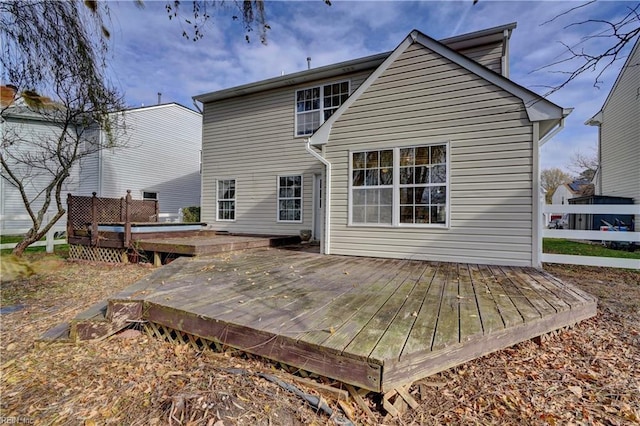 rear view of house with a deck