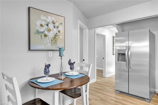 dining room featuring light wood-type flooring