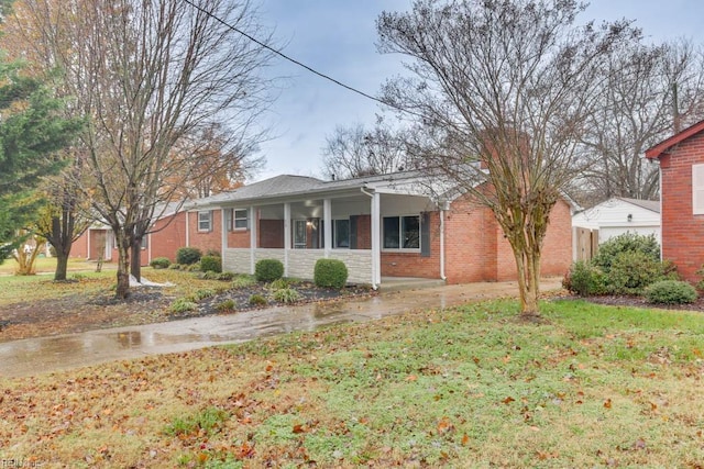 ranch-style house with a front lawn