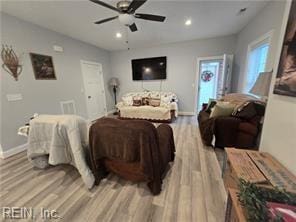 bedroom featuring ceiling fan and light wood-type flooring