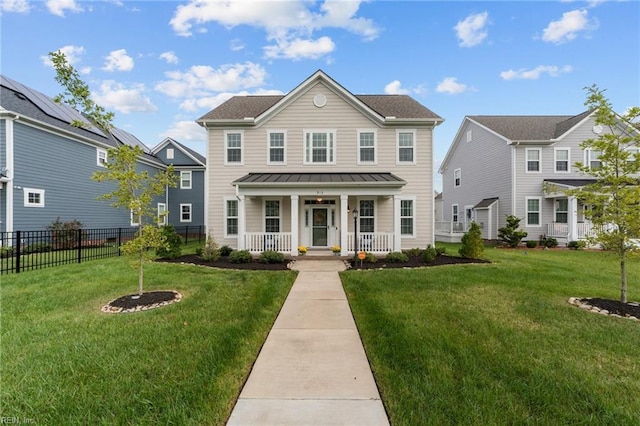 view of front of home featuring a front yard and a porch