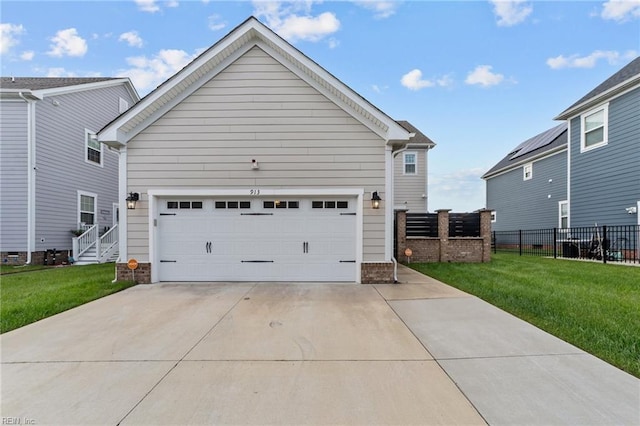 exterior space featuring a front yard and a garage