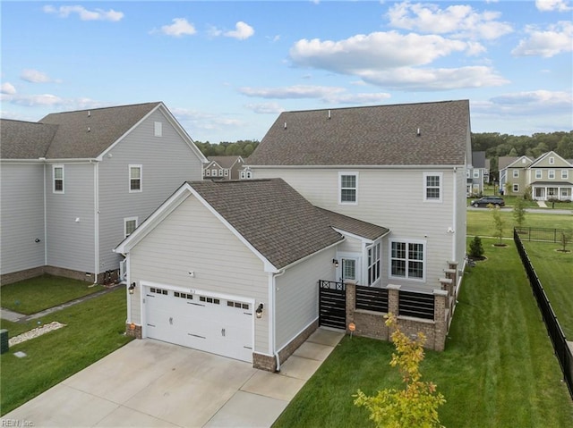 rear view of property with a lawn