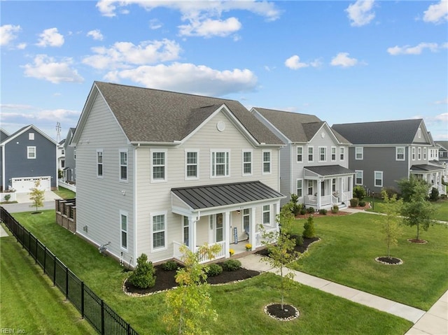 view of front of house with covered porch and a front yard