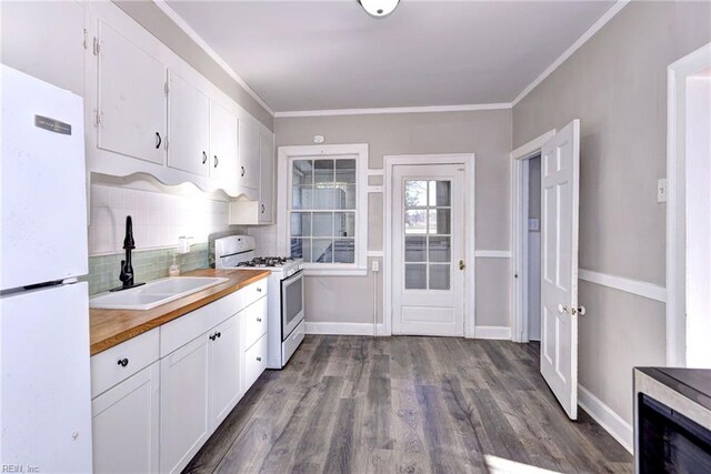 kitchen featuring wood counters, white appliances, white cabinets, sink, and dark hardwood / wood-style floors