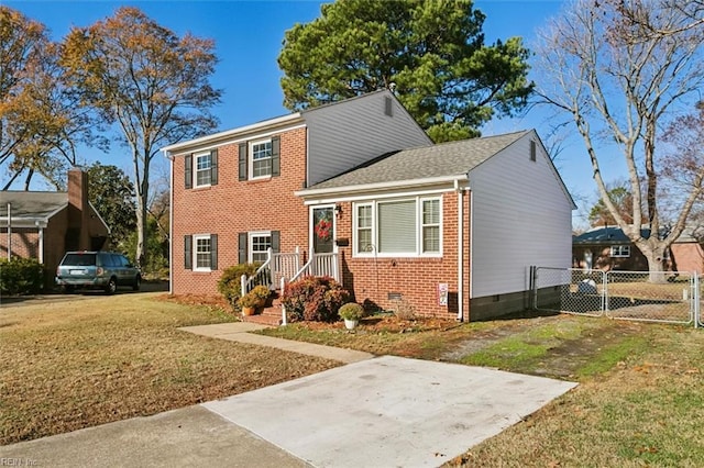 view of front facade with a front yard