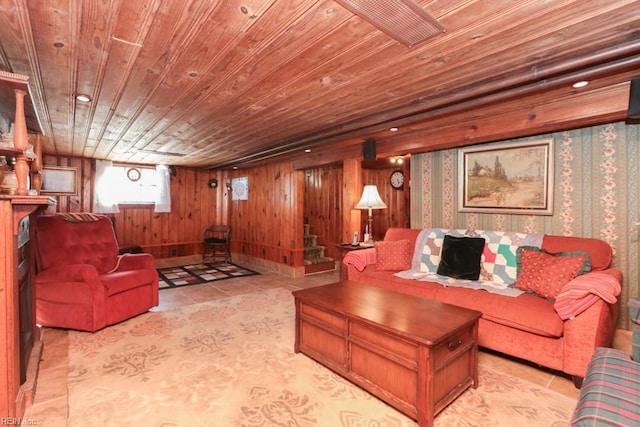 living room with wood walls, wood ceiling, and light tile patterned floors