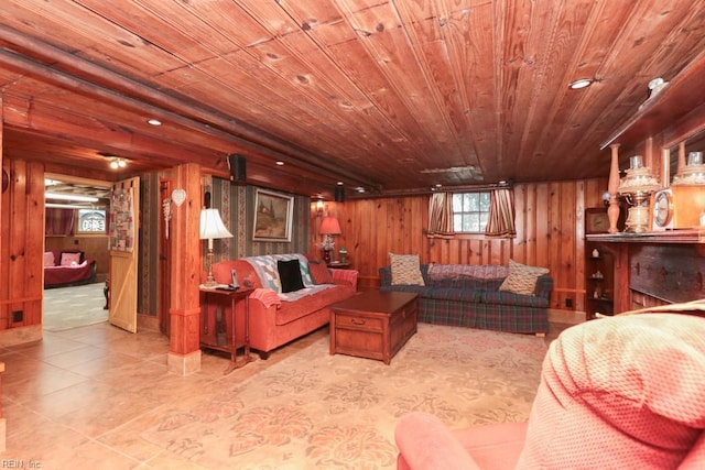 tiled living room featuring wooden walls and wooden ceiling