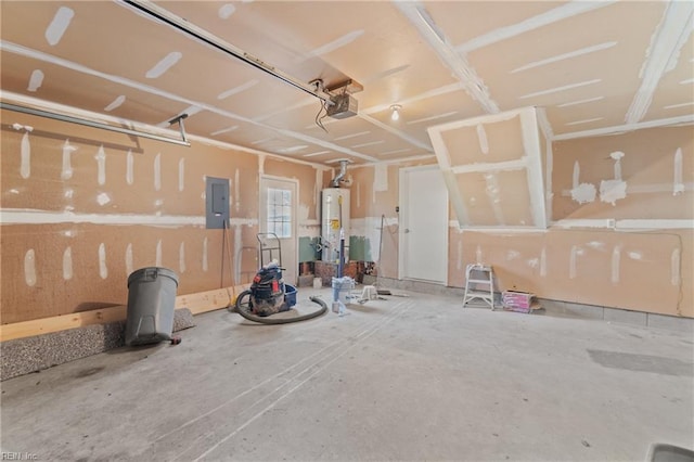 garage featuring electric panel, a garage door opener, and gas water heater