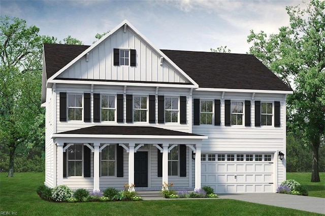 view of front of home featuring a front lawn and a garage