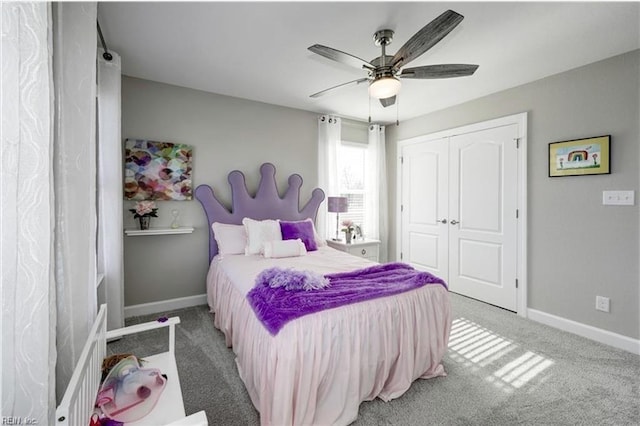 bedroom featuring carpet, a closet, and ceiling fan