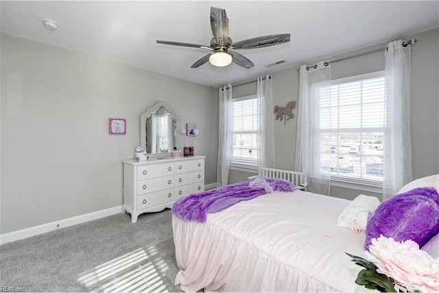 bedroom with ceiling fan and light colored carpet