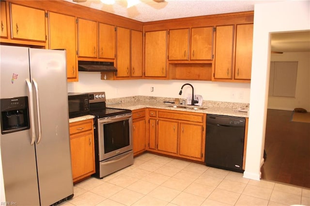 kitchen with sink and black appliances