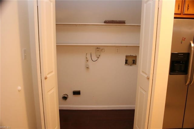 laundry room with washer hookup and dark wood-type flooring