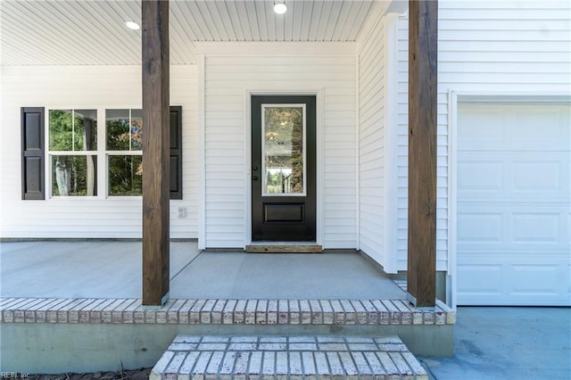 entrance to property with covered porch