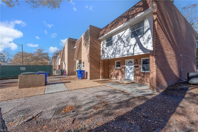 back of house with a patio