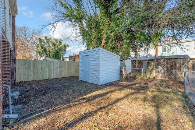 view of yard with a storage shed