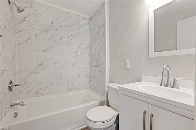 full bathroom featuring toilet, bathtub / shower combination, vanity, and a textured wall